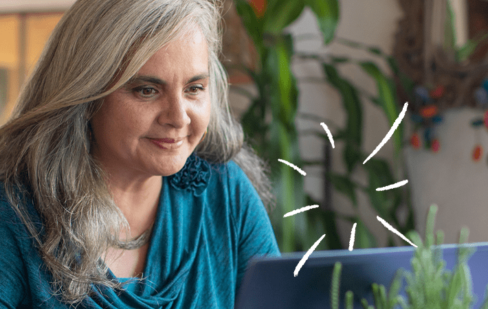 woman working on a computer (actor portrayal)