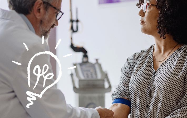 woman working with her doctor (actor portrayal)