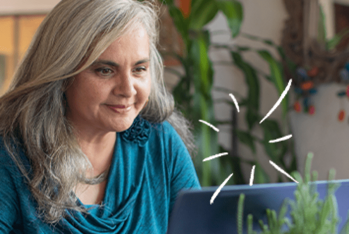 woman working on a computer (actor portrayal)