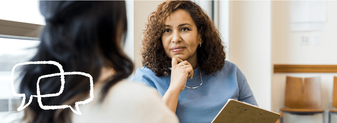 a woman listening attentively to the doctor (actor portrayal)