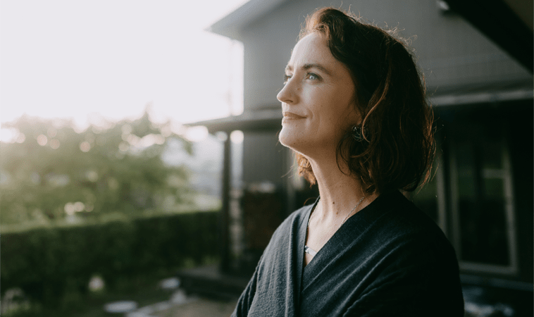 woman looking out into the distance (actor portrayal)