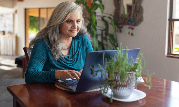 woman working on a computer (actor portrayal)